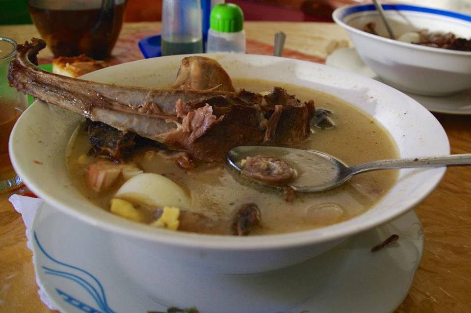 A plate of Caldo de cardan - bull penis & testicle soup