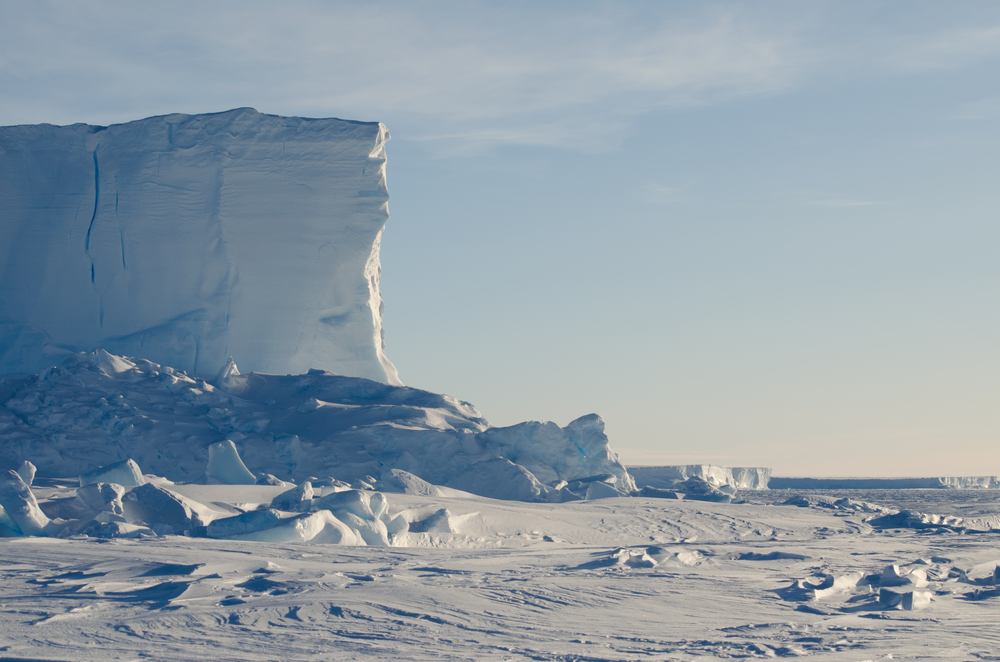 ice formation and snow with a clear blue sky