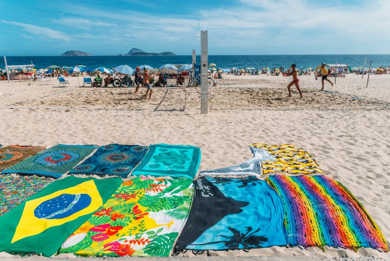 Rio de Janeiro, Brazil - January 10th, 2017: Locals, known as cariocas, play beach tennis on the beach in Ipanema, Rio de Janeiro, Brazil credit shutterstock