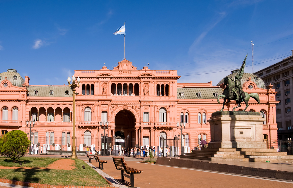 La Casa Rosada and a statue in the Plaza de Mayo