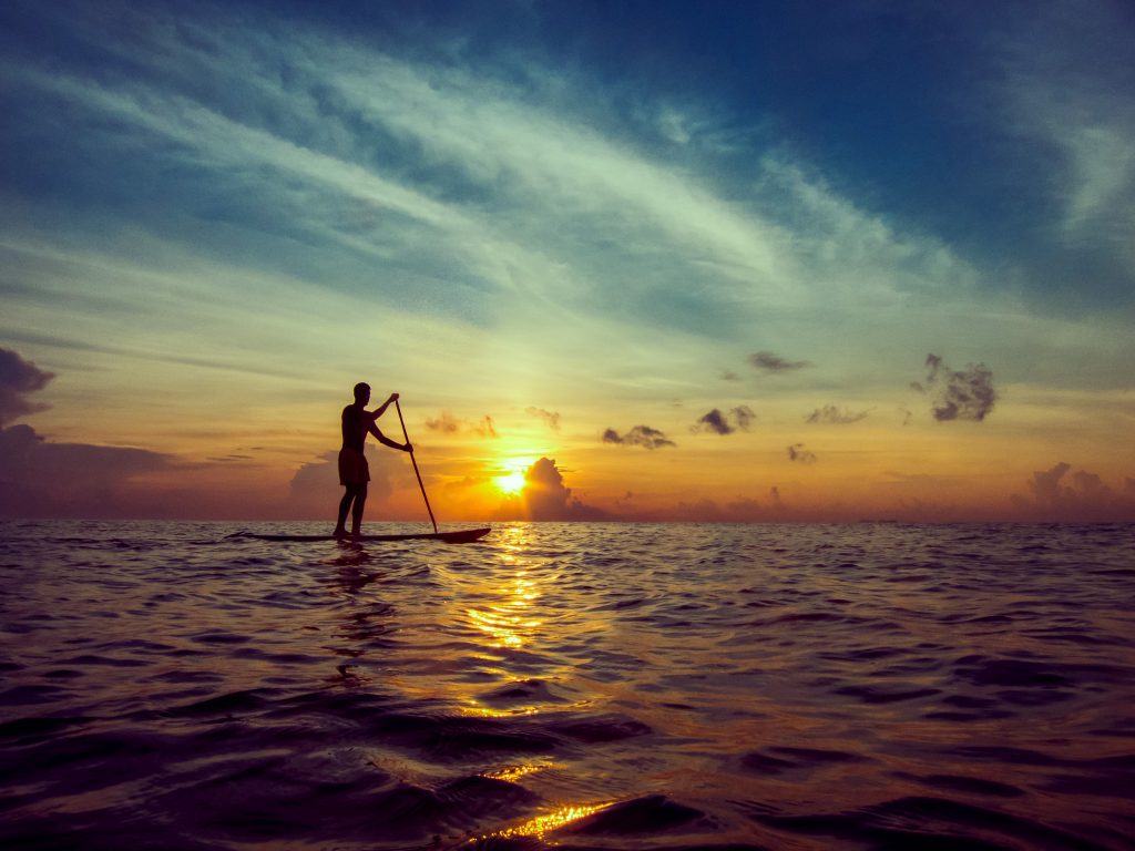 Paddle boarding.