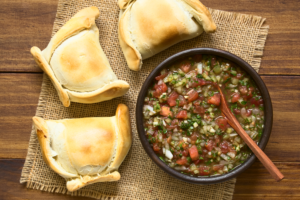 Chilean empanadas with a traditional Chilean Pebre sauc